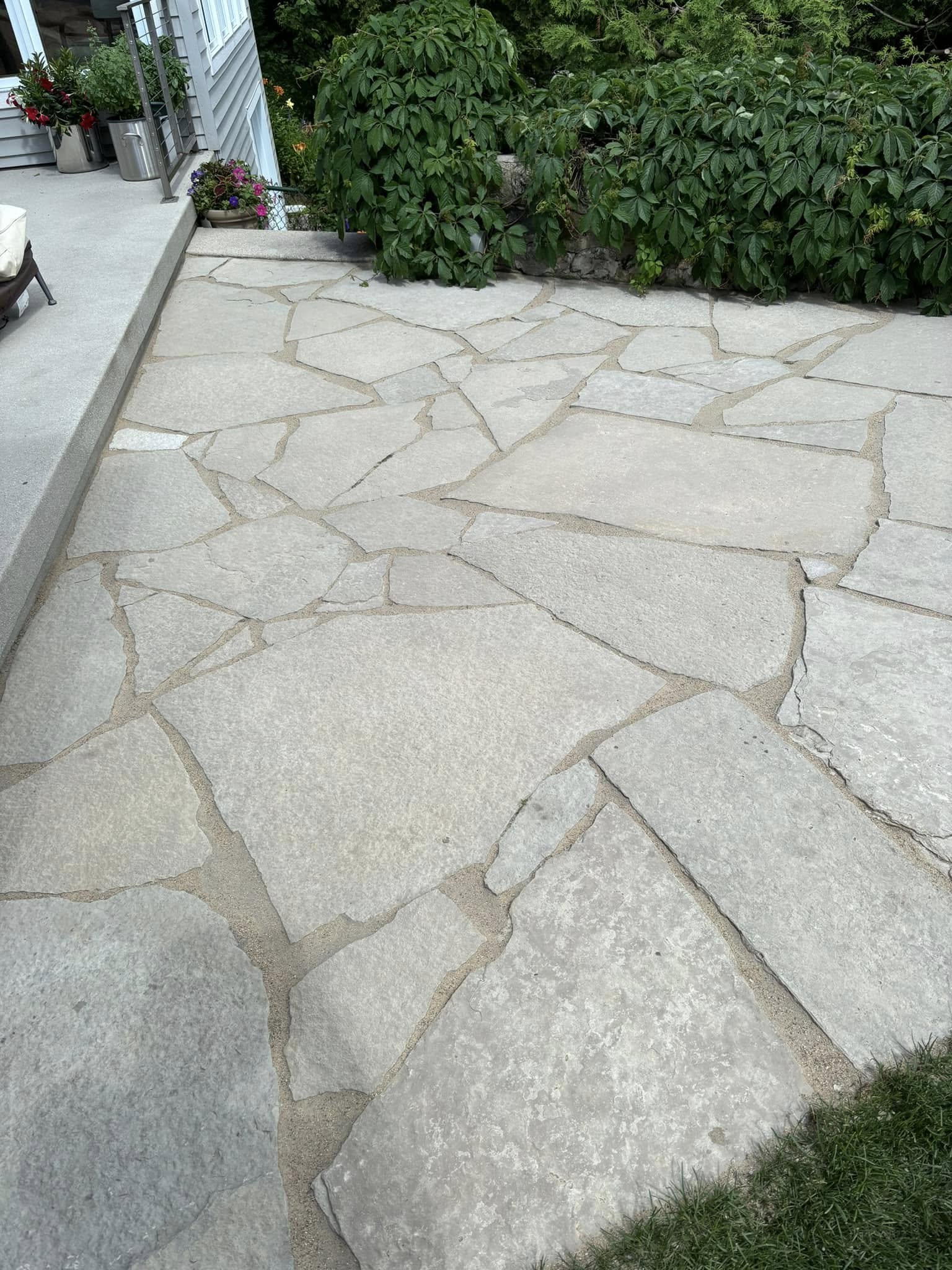Paver patio with clean polymeric-sand joint lines