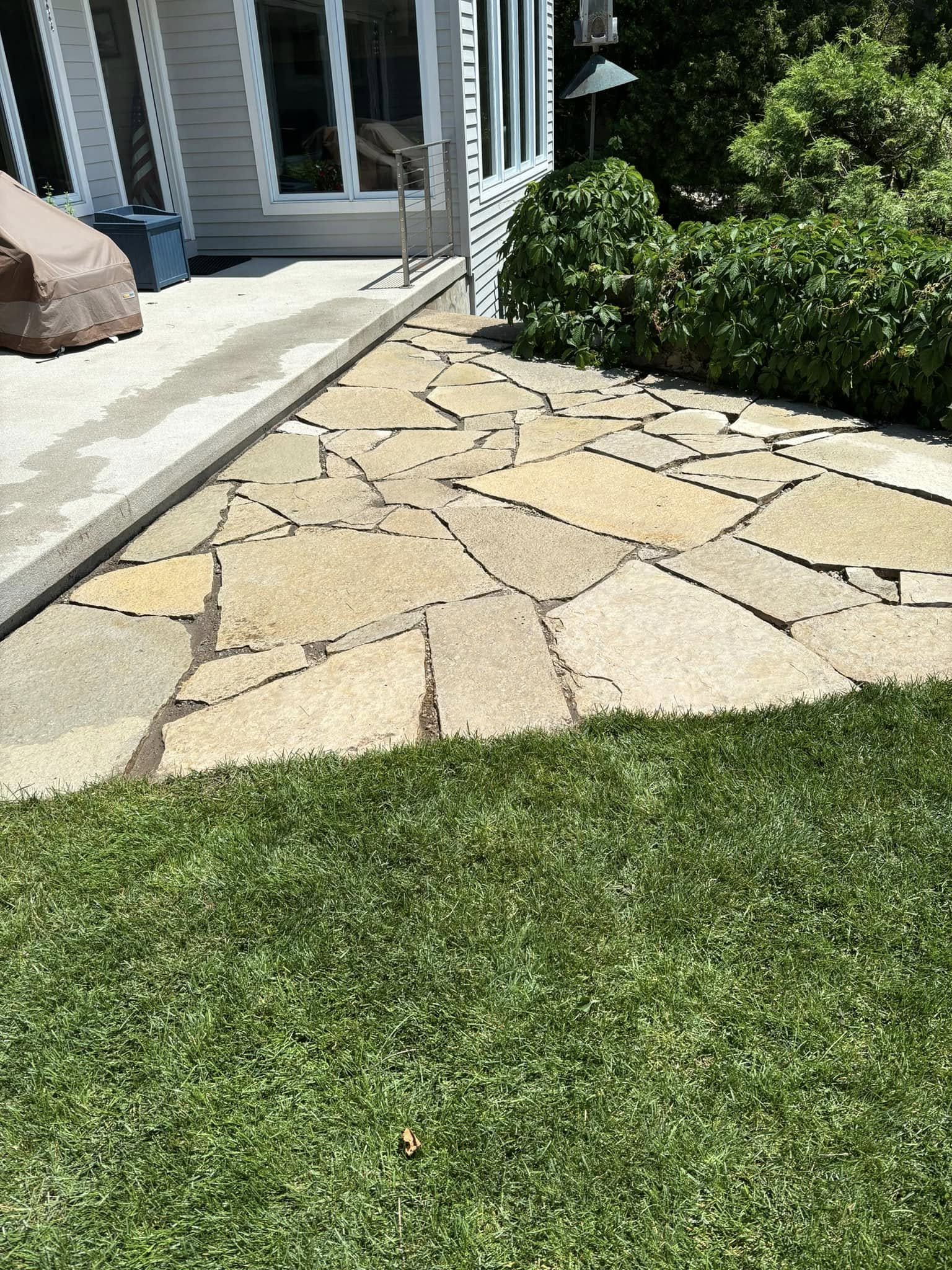 Finished paver patio with edge restraint and sealed joints